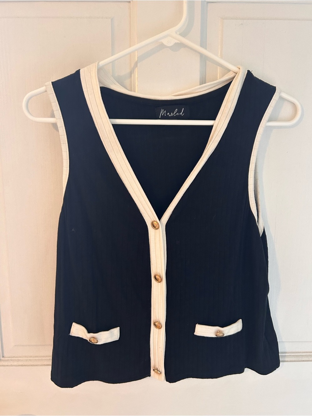 Black vest like top